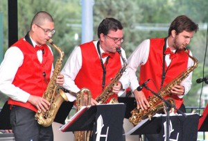 A musical number features the saxophone section.