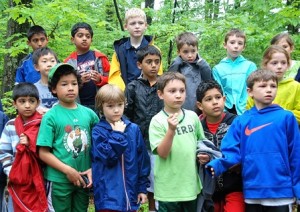 Second-graders assemble on the nature trail for instruction from their teacher, Kara Frankian, during the seventh annual 