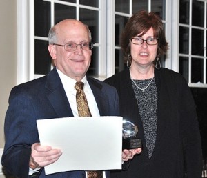 At the Shrewsbury Education Foundation's (SEF) 21st annual awards dinner, Tom Kennedy receives the Community Service Award from SEF Co-President Melanie Petrucci. He also received a citation from state Sen. Michael Moore (D-Millbury) and state Rep. Matt Beaton (R-Shrewsbury). (Photo/Ed Karvoski Jr.)