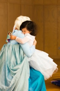 Aiko, 3, from Shrewsbury gives her favorite princess a big hug.