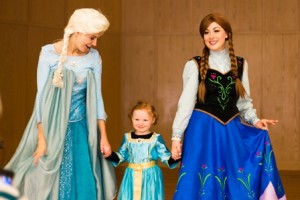Ruby, 5, from Shrewsbury poses with Elsa and Anna. 