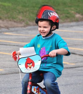 Jaxson Mater, 4, of Shrewsbury happily rides his Angry Birds bike.