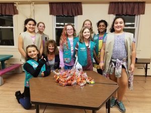 Girl Scouts deliver Halloween goodies