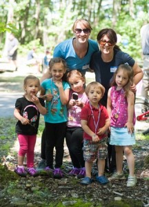 Volunteer Jill Magarro (left) and SCDC President Jenn Luke and their children (l to r) Luciana, Adeline, Ellyna, Jackson and Isabella. 
