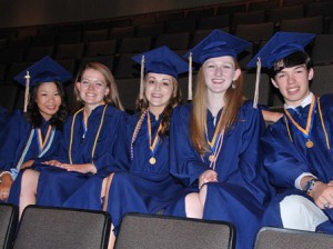 (l to r) Madison Killay, Kaleigh Keohane, Danielle Kemp, Victoria Kelly and Evan Kelley wait in the auditorium before the graduation ceremony in the field house. 