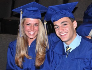 Kelly Walton and Jhad Katerji wait together for the graduation ceremony to begin.