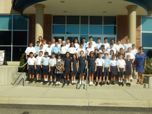 1) Current St. Mary’s sixth-grade class with Mary Cote (top left).
