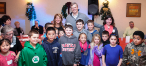 Gubernatorial candidates Charlie Baker and Karyn Polito pose with the commonwealth's next generation at the Shrewsbury Italian-American Victory Club Dec. 28. (Photo/Photos by Jodie)