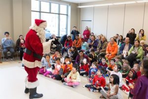 Santa entertains the crowd at a prior year's Holiday Open House at the Shrewsbury Public Library.