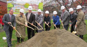 Local dignitaries including newly elected Lieutenant Governor Karyn Polito, center, dig in their shovels for the groundbreaking ceremony for the new Shrewsbury Public Library.