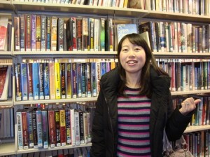 Keiko Moriwaki stands in the Shrewsbury Public Library where she made her first friends after moving from Japan. (Photo/Lori Berkey)