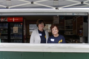 Carol (left) and Joan, Jacob's grandmother, work the concession stand at Coolidge Elementary School.