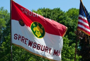 Shrewsbury flag waves proudly next to the U.S. flag.