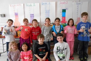 Peaslee School celebrates 100th day of school by giving back