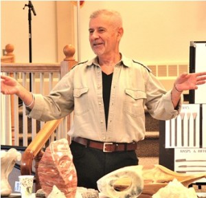 John Del Rios speaks about his wood and stone sculptures at the recent Breakfast Club meeting. Photo/Ed Karvoski Jr. 