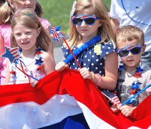 Leading the parade are (l to r) Lily Dlott, 6, Shea Domolky, 6, and Evan Dlott, 4. 