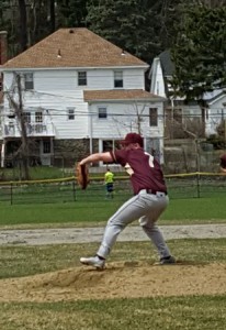 Alex Osetek delivers in earning save in Algonquin’s 4-1 victory April 22 over Doherty High at Worcester’s Foley Stadium. Photo/John Orrell 