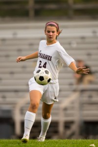 Algonquin’s Maddie Forde brings the ball up the field in a game against Quabbin.