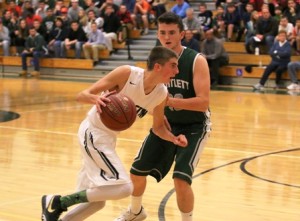 Grafton's Kyle Sawtelle tries to get past Bartlett's Kyle Anderson.