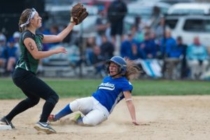 Auburn's Jennifer Tarini (#9) attempts to steal second base with Grafton's Jessica Hamilton eager to catch and tag the runner.