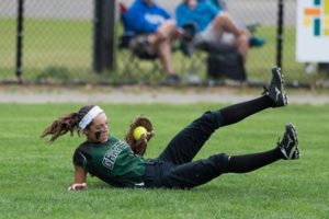 Anna Bertrand (#11) makes a sliding catch to get an out for Grafton late in the game. 