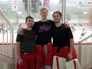 Hudson High varsity ice hockey senior captains (l to r) Drew Jackson, Jarod Leahy, and Adam Devlin Photo/John Orrell 