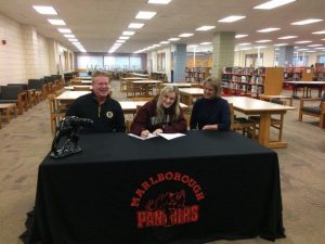 Megan Saari with her parents, Holly and Scott. (Photos/submitted)