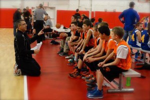 Coach Chris Parrinello instructs his Marlborough fifth-grade boys’ team during their state title run.