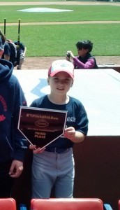 Cole Jones with his third place Pitch, Hit and Run Award at Fenway Park.