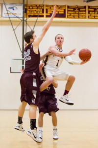 Algonquin’s Kyle Hill appears to levitate as he jumps high in a game against Westford.