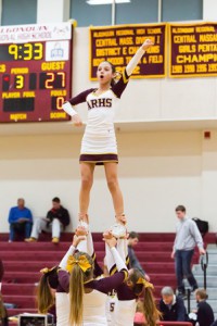 Algonquin cheerleaders perform at halftime during the game against Westford.   