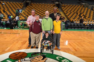 (l to r, front, standing) Sean Durkin, Will Corwin, Steve Summers, Will Iverson and (front, sitting,) Ryan Summers pose for a photo at the TD Garden center court with former Boston Celtics star Cedric Maxwell. (Photo/submitted)
