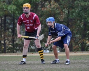Daniel Donahue (left) sets up against the University of Connecticut in the Fall League 2013.
