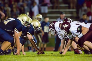 The Shrewsbury Colonials face off against the Algonquin Regional Tomahawks in a game held under the lights at Shrewsbury High School. 