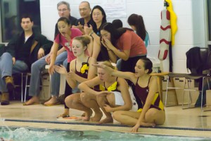 Algonquin swimmers cheer on their teammates during a meet against Westborough. 