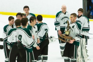 Wachusett’s Tanyon Ventres carries the Borough’s Cup to his teammates.