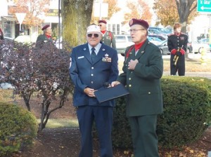 George A. Perry III and the Westborough veterans agent / director veterans services,and Kenneth Ferrera, the assistant veterans agent, lead the ceremony at the World War I Memorial. 