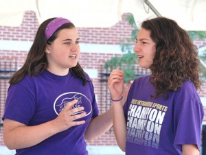 Helena Spofford and Cary Lurier of the Westborough High School Improv Troupe create a comedic sketch.