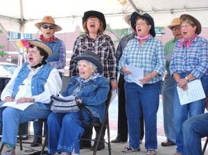 Singing the Broadway tune “Oklahoma” are members of the Southborough Senior Songsters, directed by Jim and Linda Duncan of Westborough.