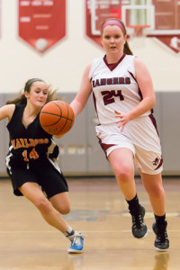Westborough’s Nicole Foster (#24) brings the ball down the court. 