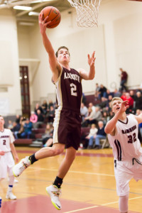 Algonquin senior Gavin Boyden goes up to shoot in a game against Westborough