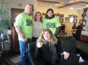 Anita Rogers of Hopkinton is thrilled that her hair appointment at Michelle’s South Street Salon will be paid for courtesy of Central One.  (l to r, back) Kaiser, Michelle Poulin, the salon’s owner and Kodun 