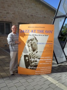 Eugene Cantera with a concert poster for the Wilderness School in Australia. (Photo/submitted)