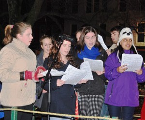 Members of the Westborough High School chorus sing carols. 