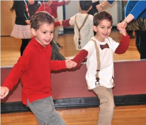 Julian Miculli, 6, and his brother, Sebastian, 4, do an Italian dance known as the tarantela.  