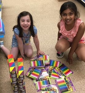 Young Westborough girls share ‘business’ profits to help other kids