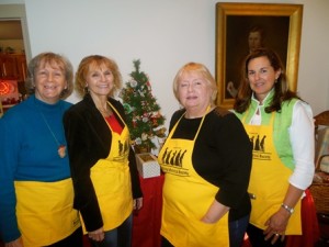 Alberta Monroe, Kathlyn Laflamme, Blair Gately and Cary Mulvain, president of the Westborough Historical Society, help out at the annual Holiday Boutique and Flea Market. Photo/Nance Ebert 