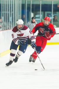 Westborough’s Maxwell McGourty brings the puck up the ice during a game against North Middlesex. 