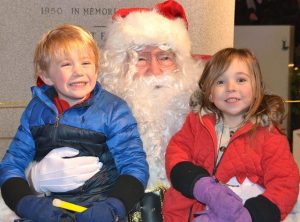 The Preston siblings – Emmitt, 5, and Charlotte, 3 – are happy to meet Santa at the rotary.