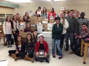 Westborough High School students pose with boxes of new biotech equipment. Photo/submitted 